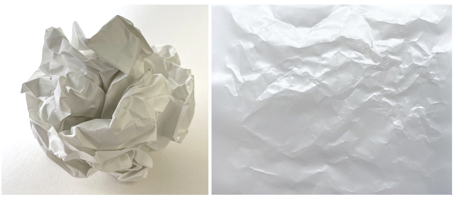 図6: くしゃくしゃに丸めた紙。広げてみると折り目とそうでない部分が混在しているのがわかる。折り目は塑性変形しているが、そうでない部分は依然としてフックの法則が成り立っているのは注目に値する。